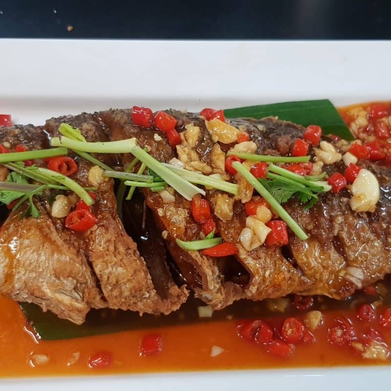 Fresh Seabass served with chillis